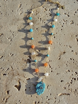 Collier Main